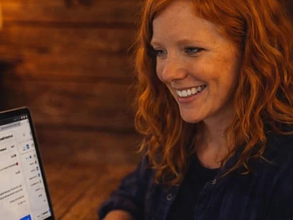 Sato Code team member reviewing and responding to customer inquiries